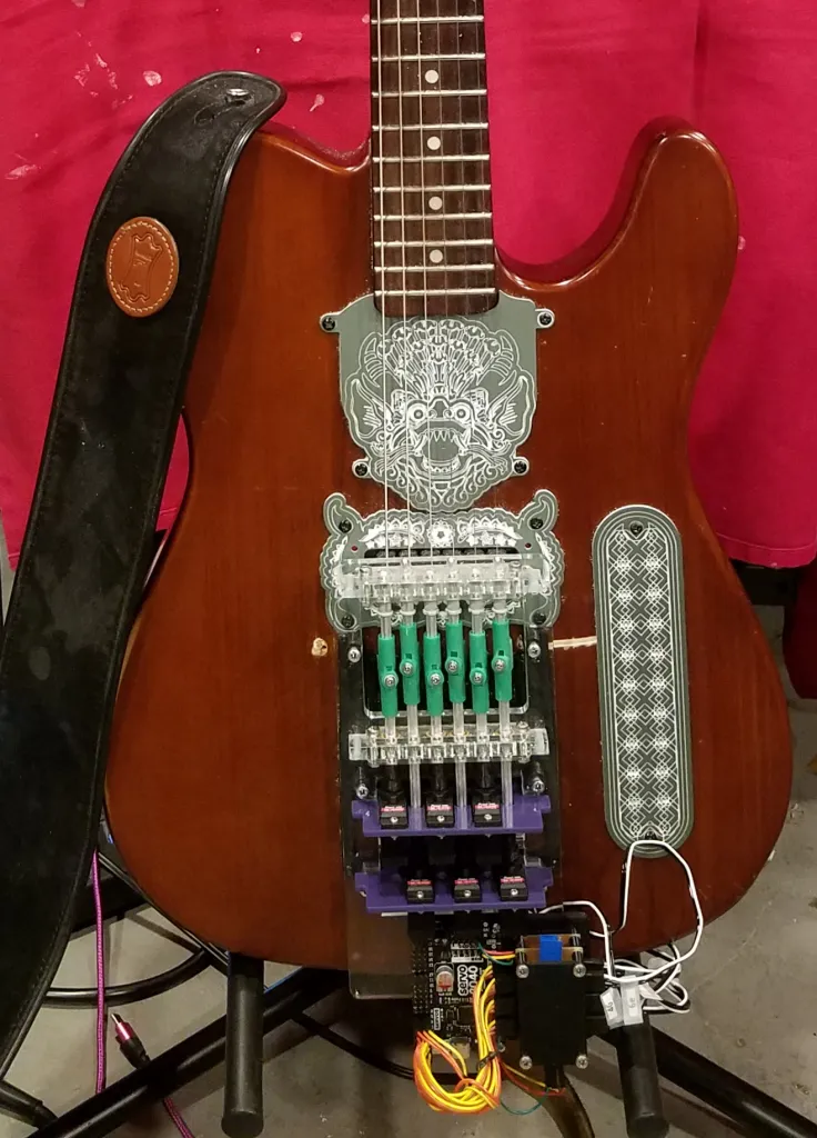 Robot Guitar that helps to play Music